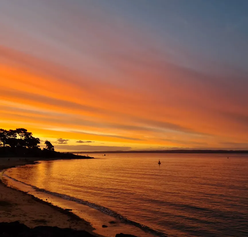 Sails at Sunset Cowes beach